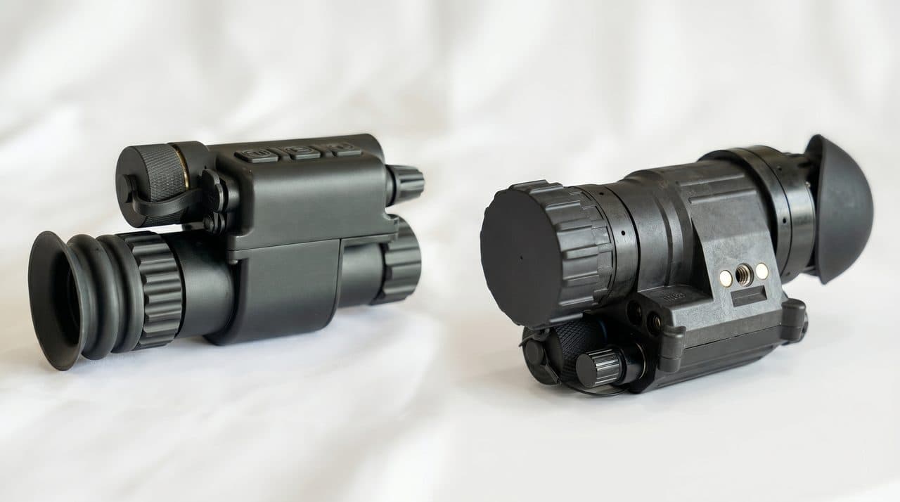 Digital night vision monocular alongside analog NVG — technology comparison