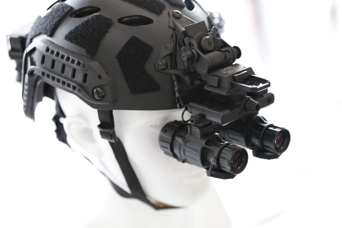 Astra night vision device mounted on helmet in field use